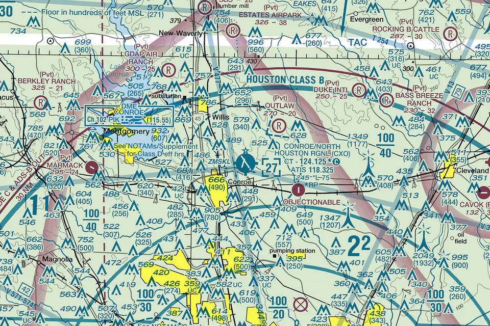 FAA VFR sectional chart centered on Conroe / North Houston Regional Airport (KCXO), showing the surrounding airspace, nearby fields and terrain