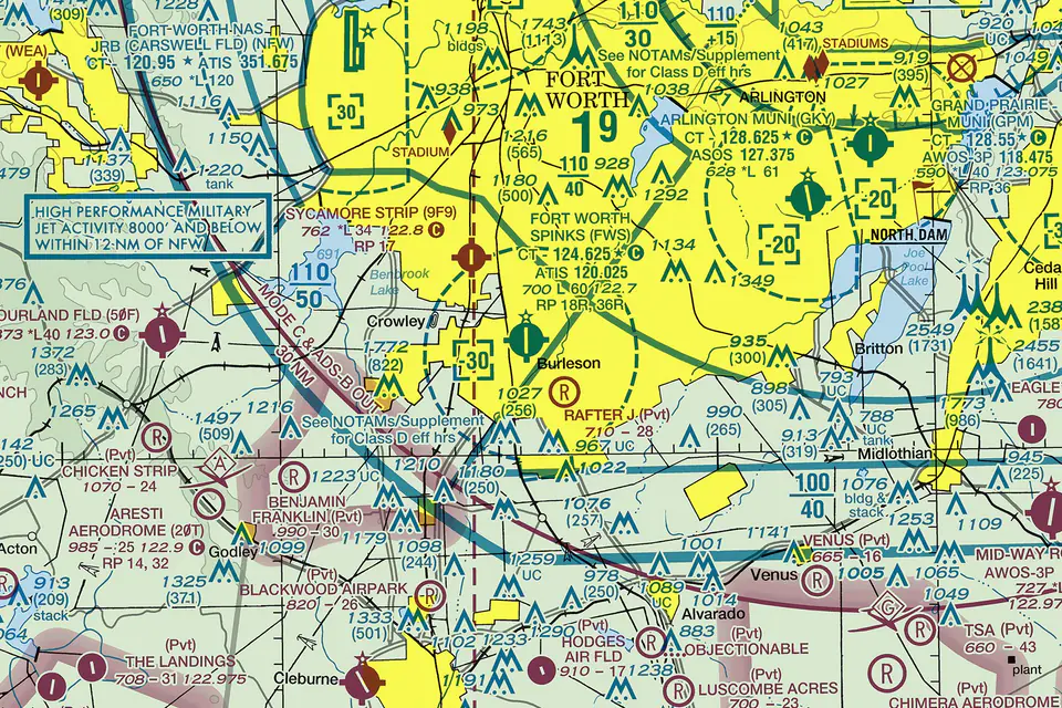 FAA VFR sectional chart centered on Fort Worth Spinks Airport (KFWS), showing the surrounding airspace, nearby fields and terrain