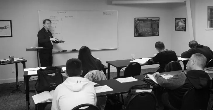Flight instructor teaching a ground school class at Thrust Flight