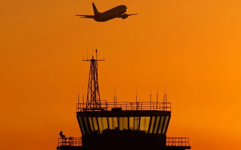 atc communications with a view at sunset