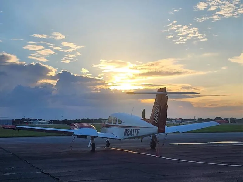 Thrust Flight Piper Seminole on the ramp at sunset
