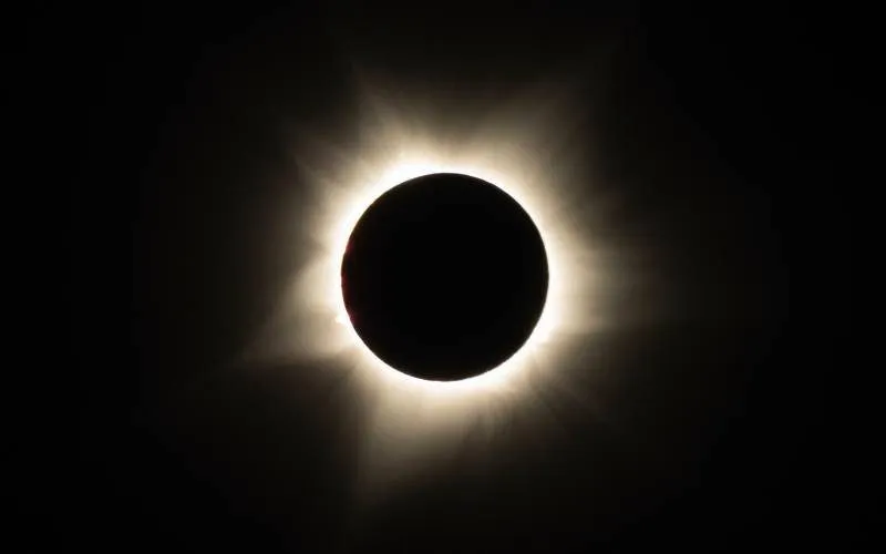 Flying in an eclipse
