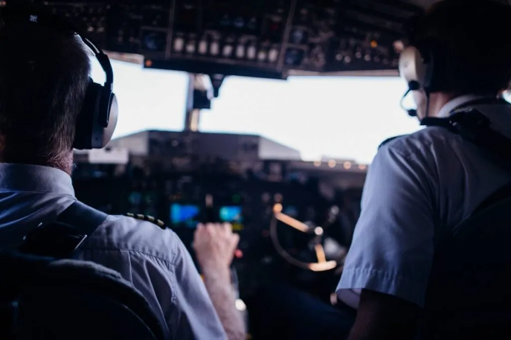 pilots in the cockpit using crew resource management
