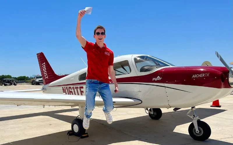 Student pilot after completing a first solo flight