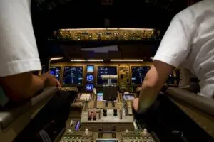 pilots in the flight deck