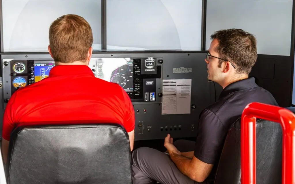 flight students practicing accelerated stalls in the simulator